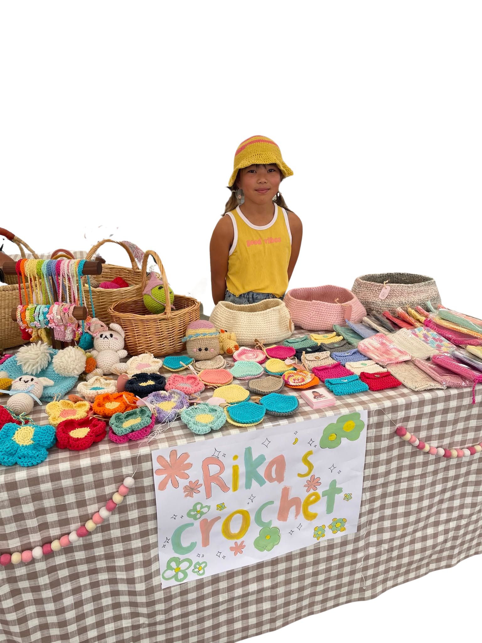 Rika at her Rika&rsquo;s Crochet booth at the Nova Vita summer festival, age 9